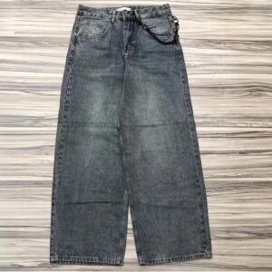 stonewashed blue colored dirty wash patterned baggy denim pants