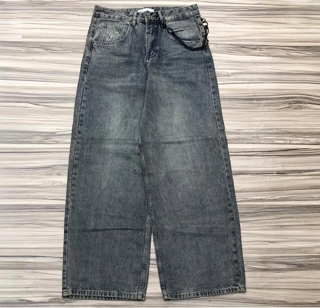 stonewashed blue colored dirty wash patterned baggy denim pants