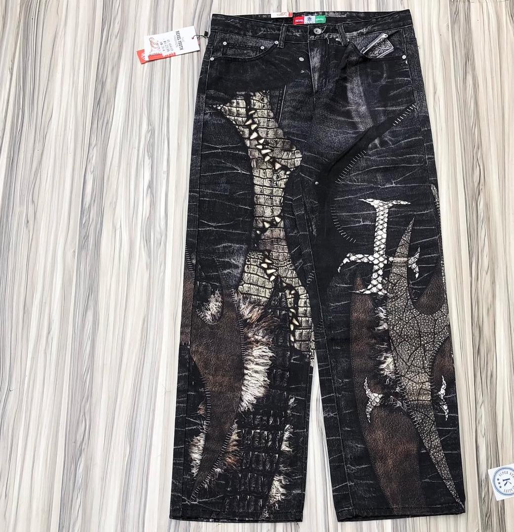 stonewashed blue colored dirty wash patterned baggy denim pants